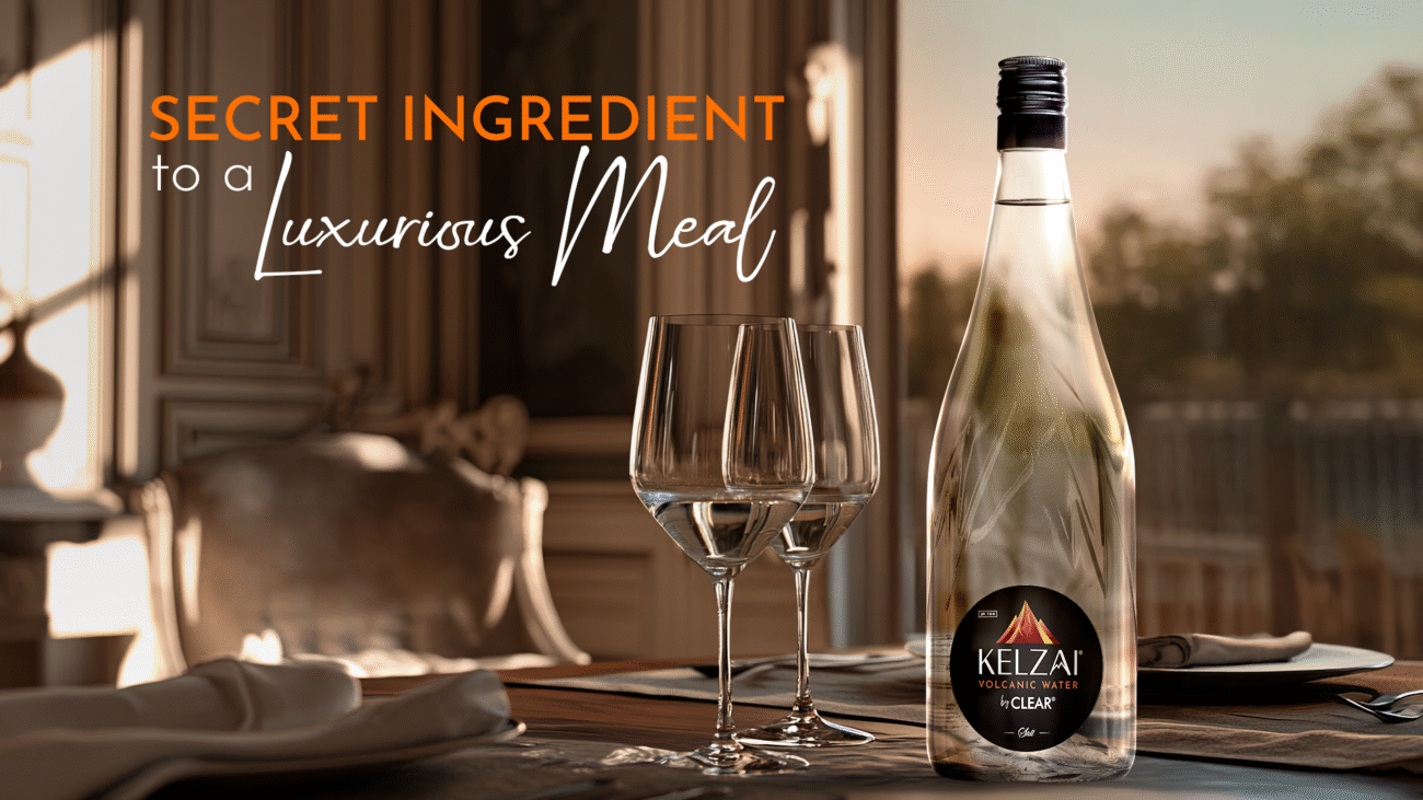 Elegant glass bottle of Kelzai volcanic alkaline water served at a luxury Indian dining table